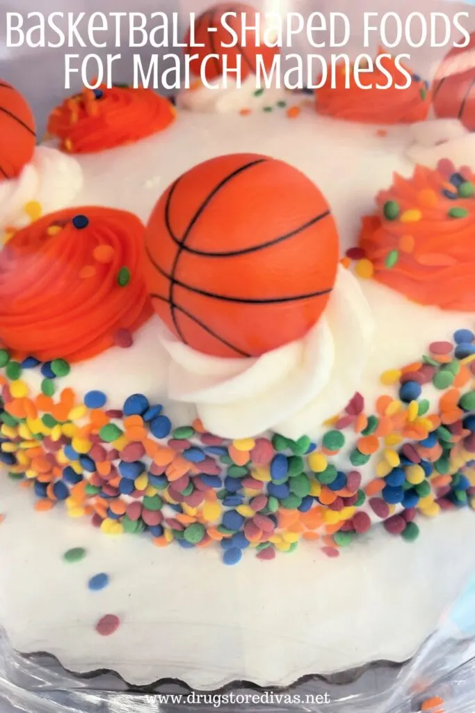 A cake with basketball decorations on it and the words "Basketball-Shaped Foods For March Madness" digitally written on top.