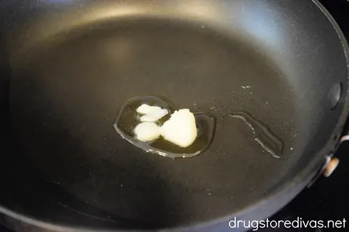 Bacon fat melting in a pan.