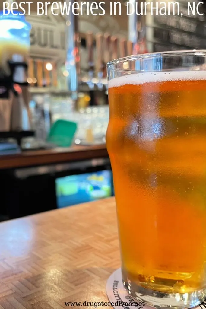 A beer on the counter in a brewery with the words "Best Breweries In Durham, NC" digitally written on top.
