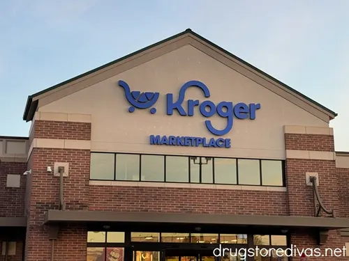The outside of a Kroger grocery store.