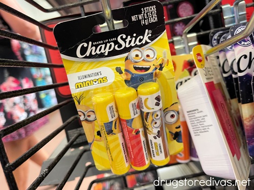 A pack of Minions chap stick on a peg in a store.