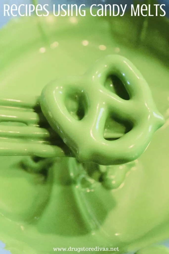 A fork picking up a pretzel that's covered in green candy melts over a bowl of melted green candy melts with the words "Recipes Using Candy Melts" digitally written on top.