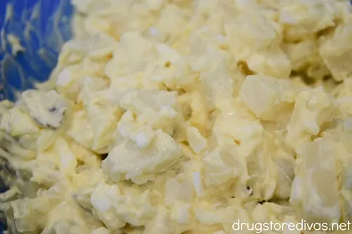 Classic potato salad in a blue bowl.