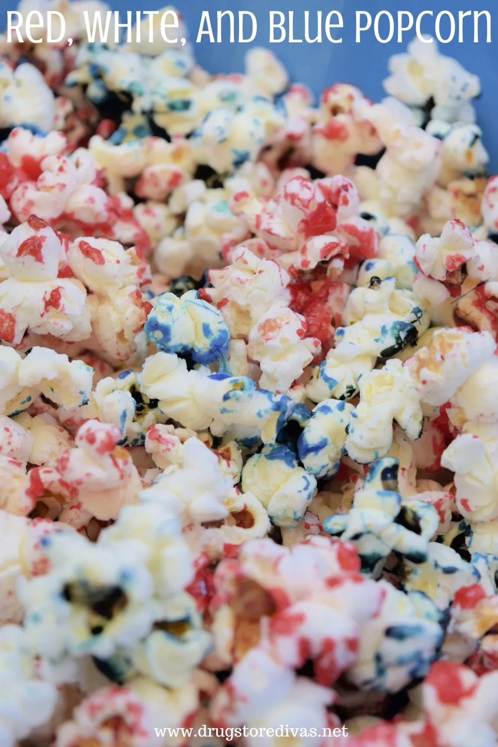 Popcorn that's dyed red and blue in a blue bowl with the words 