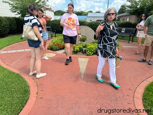 Four women walking in a park in Aberdeen, NC.