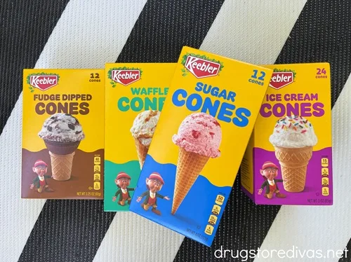 Four boxes of Keebler ice cream cones on a black and white background.