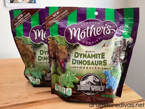 Two bags of Mother's Dinosaur-shaped cookies on a table.