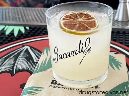 A cocktail in a glass that says Bacardi.