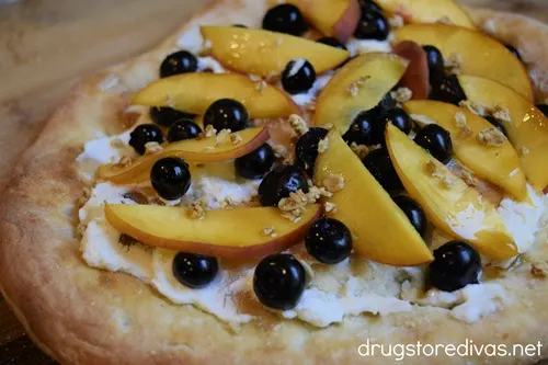 A Peach, Blueberry And Goat Cheese Pizza.