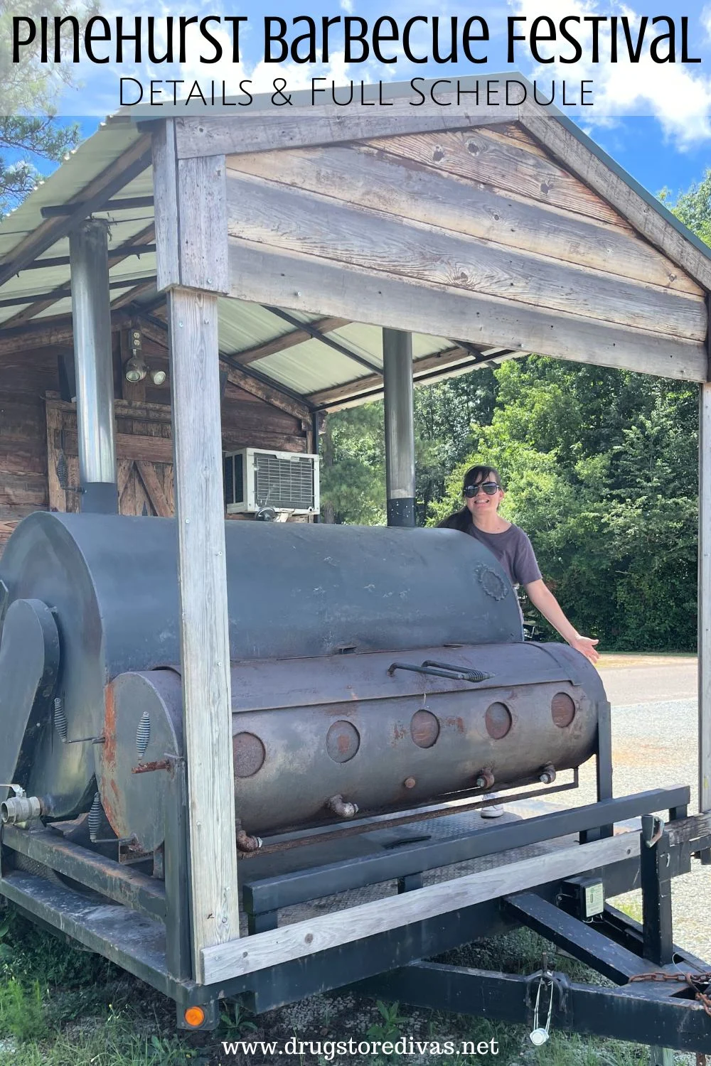 A woman standing behind a smoker in a wooden structure with the words 