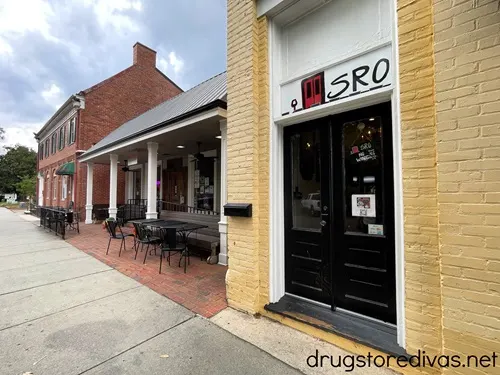 A wine bar with a sign saying SRO on the outside in Southern Pines, NC.