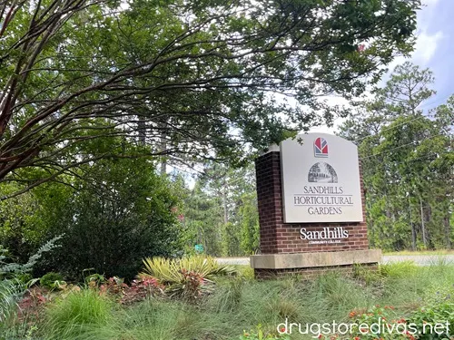 A sign advertising the Sandhills Horticultural Gardens.