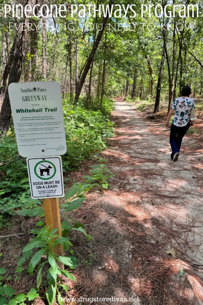 A woman walking on a trail with the words "Pinecone Pathways Program: Everything you need to know" digitally written on top.