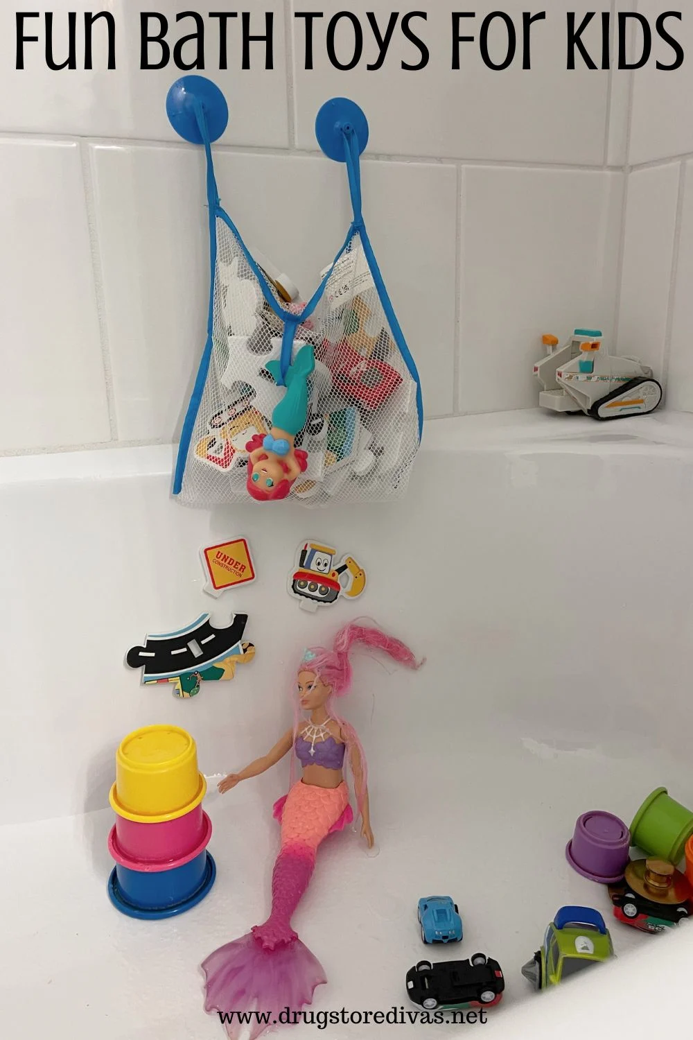 A bath filled with bath toys, like foam stickers, a mermaid doll, stacking cups, and more, and the words 