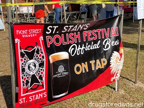 A large sign advertising St. Stan's Polish Festival Official Beer.
