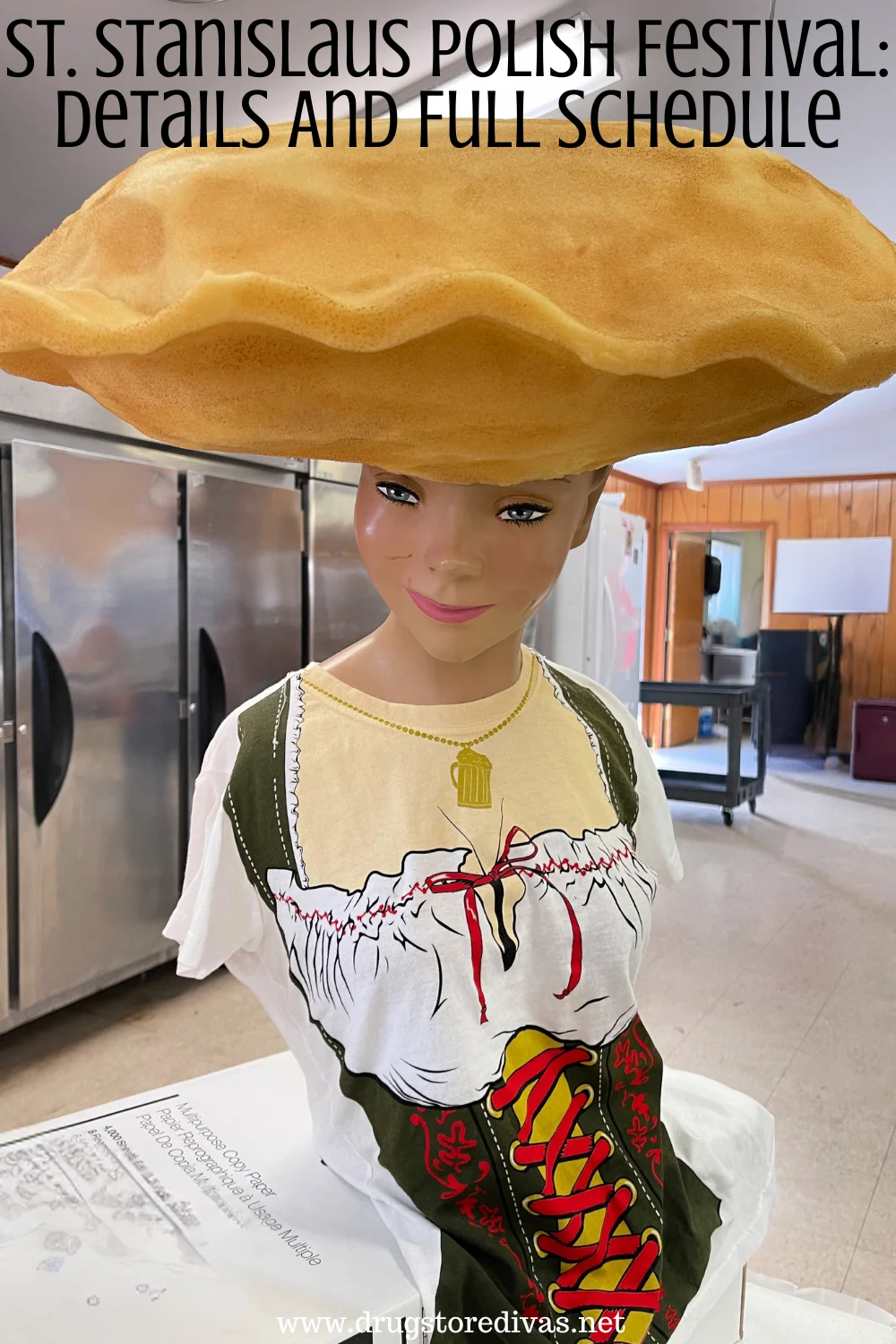 A mannequin with a pierogi hat in a kitchen with the words 