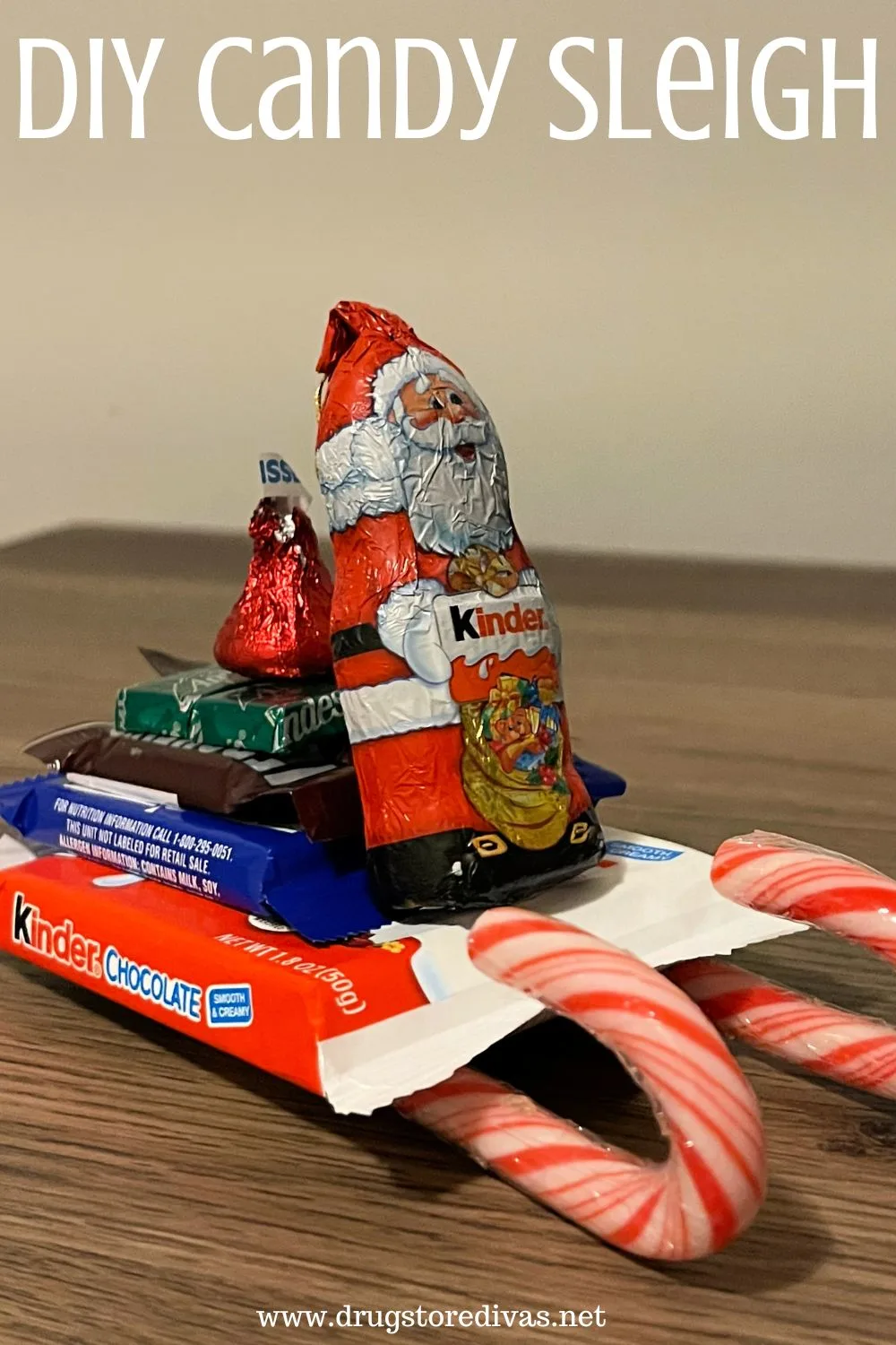 Santa's sleigh made out of candy on a table with the words 