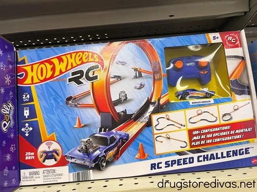 A Hot Wheels RC Speed Challenge playset in the box on a shelf in a store.