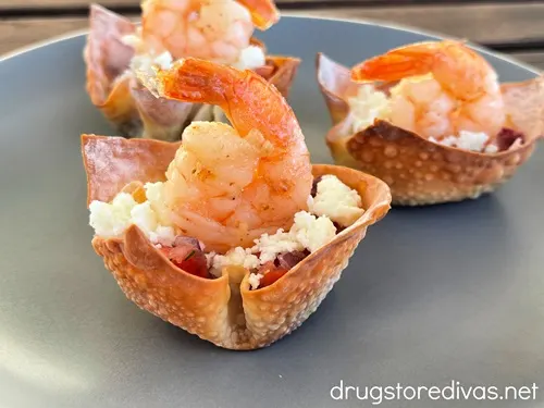 Three Chili Lime Shrimp Wonton Cups With Pico De Gallo on a plate.