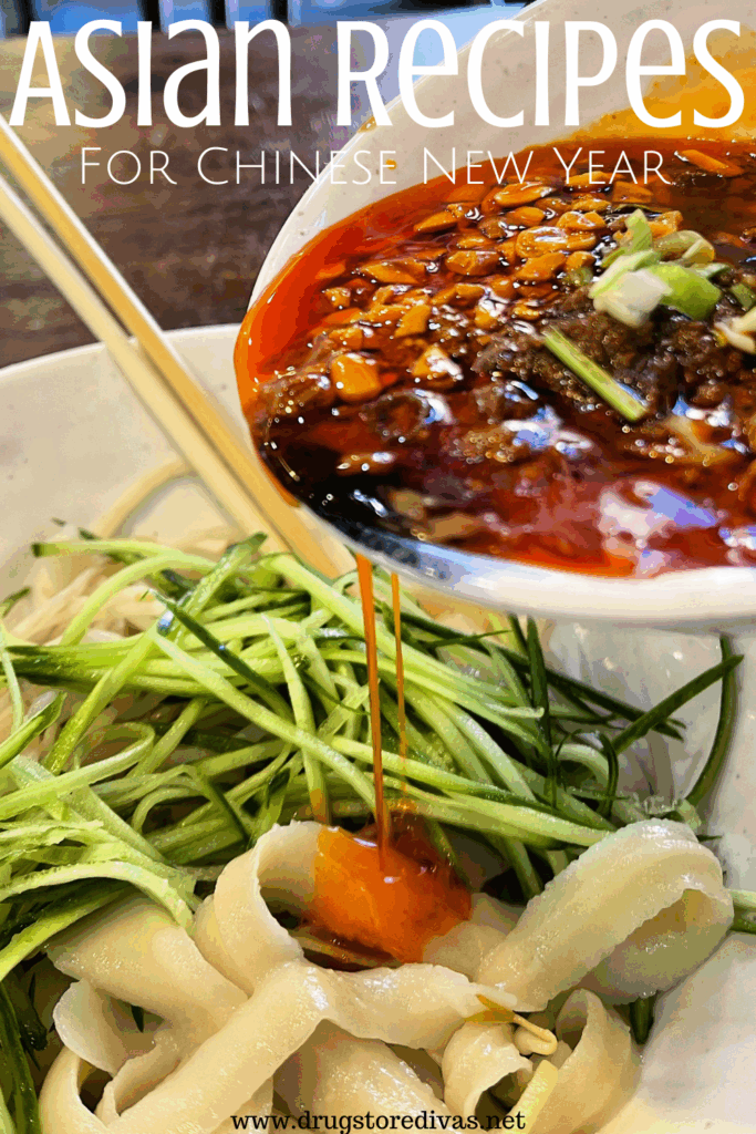 A bright red broth being poured from a white bowl onto noodles and sliced greens with the words "Asian Recipes For Chinese New Year" digitally written on top.