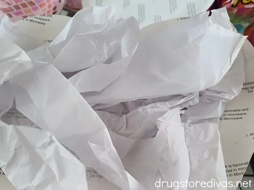 Crumbled white tissue paper.