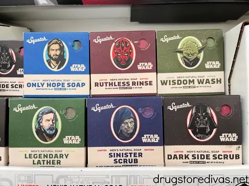 Five bars of Dr Squatch Star Wars soap on a shelf in a store.
