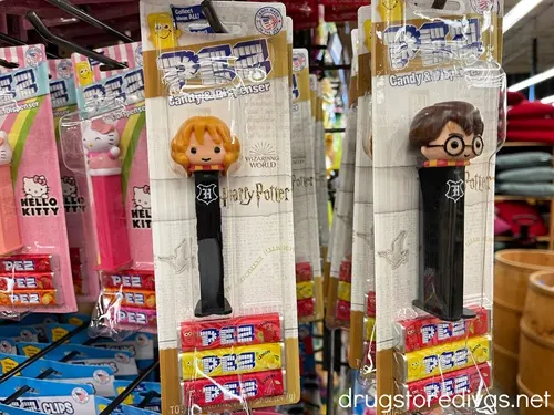 Harry Potter Pez dispensers on display in a store (behind them are Hello Kitty Pez dispensers that are not the main focus of the image).