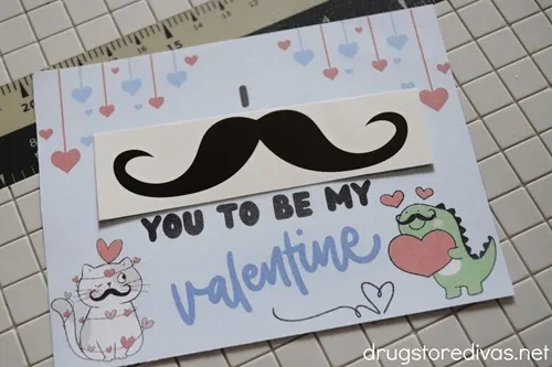 A blue DIY Mustache Tattoo Valentine's Day Card.