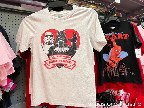 A Star Wars-themed Valentne's Day shirt for boys hanging on a rack in a store.