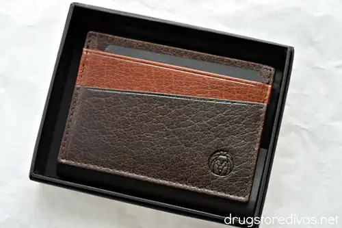 A brown wallet in a box.