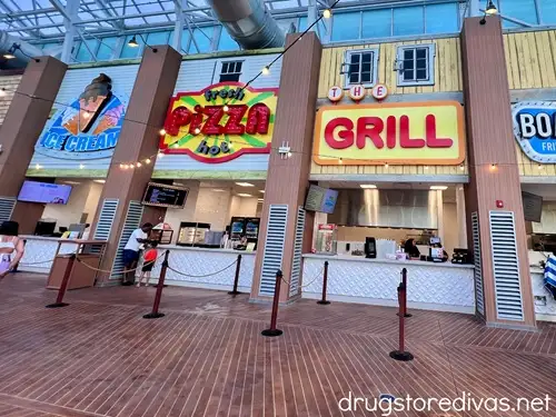 An indoor boardwalk with food kiosks inside Island Waterpark at Showboat Hotel.