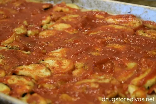 Marinara sauce in a sheet pan.