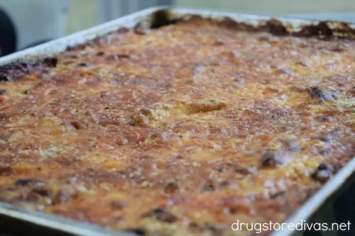 A baked sheet pan of eggplant parmesan.