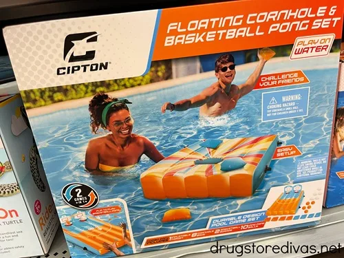 A box containing a floating pool cornhole game.