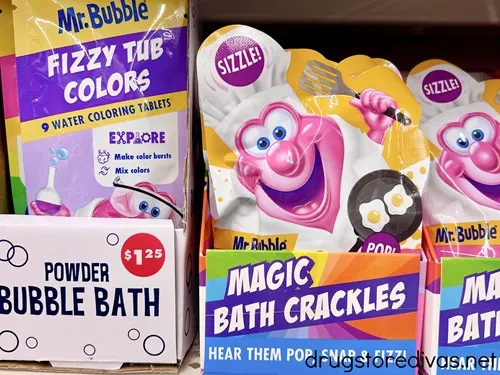 Three packs of Mr Bubble bubble bath on a shelf.