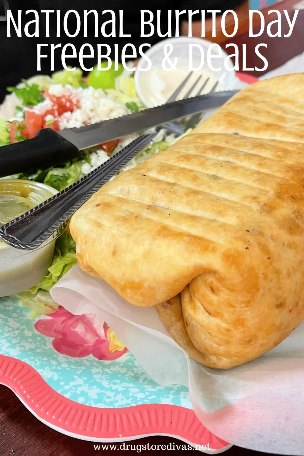 A burrito on a plate next to a green salad with a knife and fork on top and the words "National Burrito Day Freebies & Deals" digitally written on top.