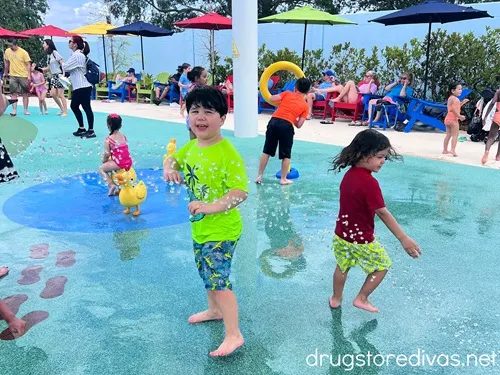 Children playing in the splash pad area of the Peppa Pig Theme Park in Winter Haven, Florida.
