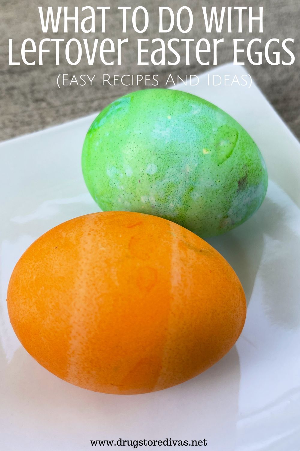 An orange and green dyed Easter eggs on a white plate with the words 