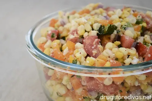 Corn salsa in a clear bowl.