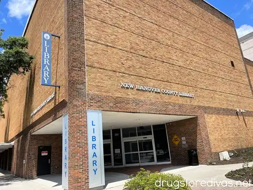 The outside of a brick building, which is the New Hanover County Public Library, in downtown Wilmington, NC.