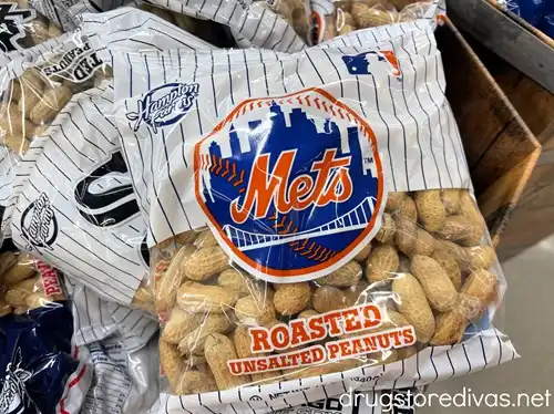 A bag of peanuts with a New York Mets logo on the outside.