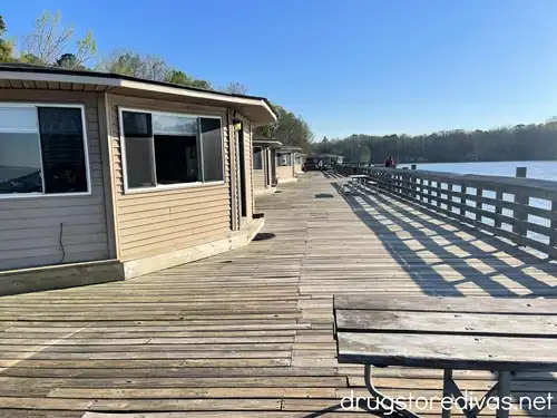 Cabins on the water along a long wooden pier at Santee State Park in Santee, SC.