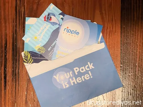 A blue envelope that says "Your Pack Is Here!" with advertisements for Starkist tuna and Ripple Street.