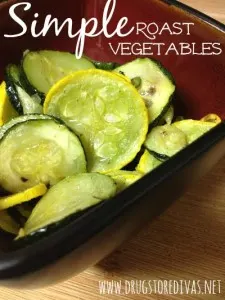 Zucchini and yellow squash in a red bowl with the words "Simple Roast Vegetables" digitally written top.