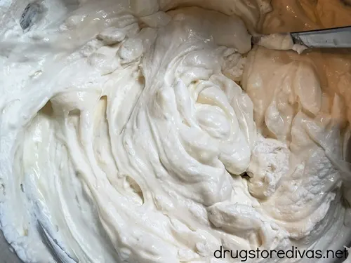 Vanilla ice cream in a stand mixer bowl.