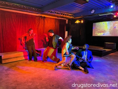 Four people in a performance at Barzarre in the Cargo District in Wilmington, NC.