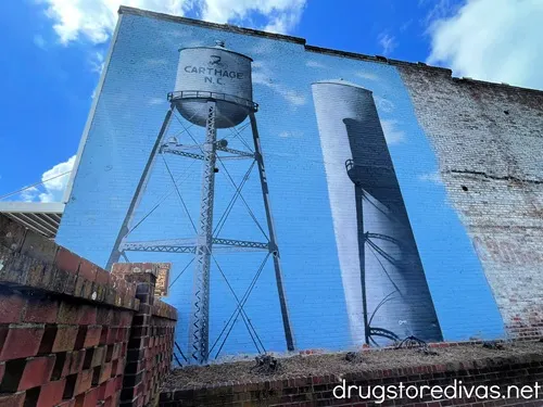 A mural of two water towers called Carthage Water Tanks.