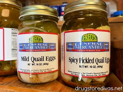 Two glass jars filled with quail eggs on sale at Fred's General Mercantile in Beech Mountain, NC.