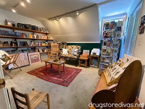 A room that looks like a study with books and greeting cards for sale at Fred's General Mercantile in Beech Mountain, NC.