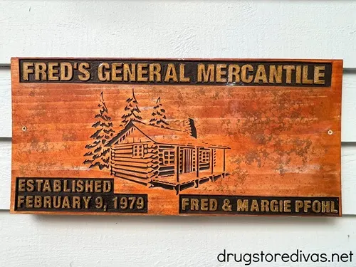 A wooden sign that says Fred's General Mercantile on it.